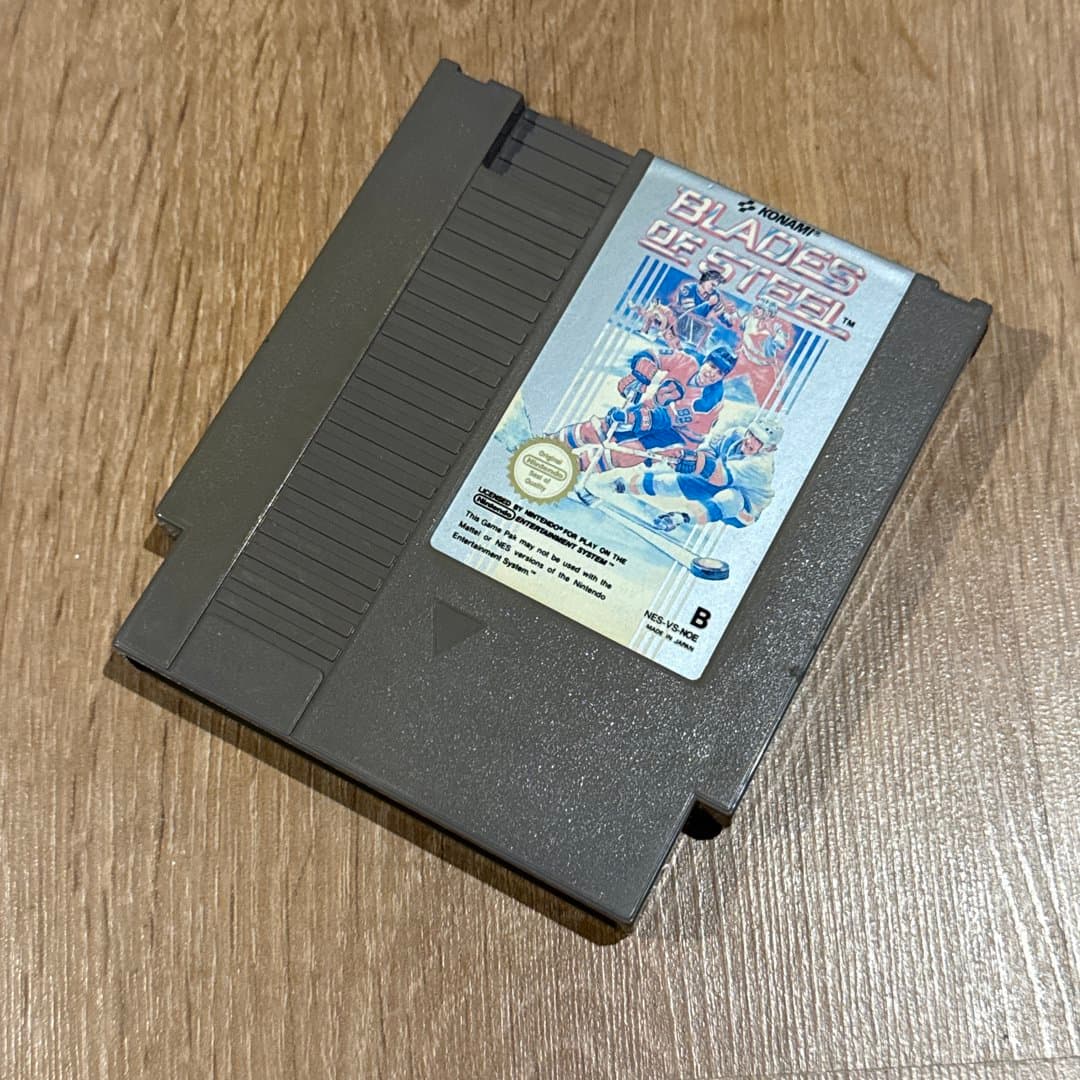 Classic Konami Blades of Steel NES game cartridge, a vintage hockey video game. - Photo 1