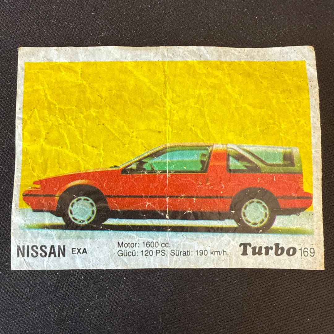 Vintage trading card featuring a red Nissan EXA Turbo car with its specifications. Turbo Gum.